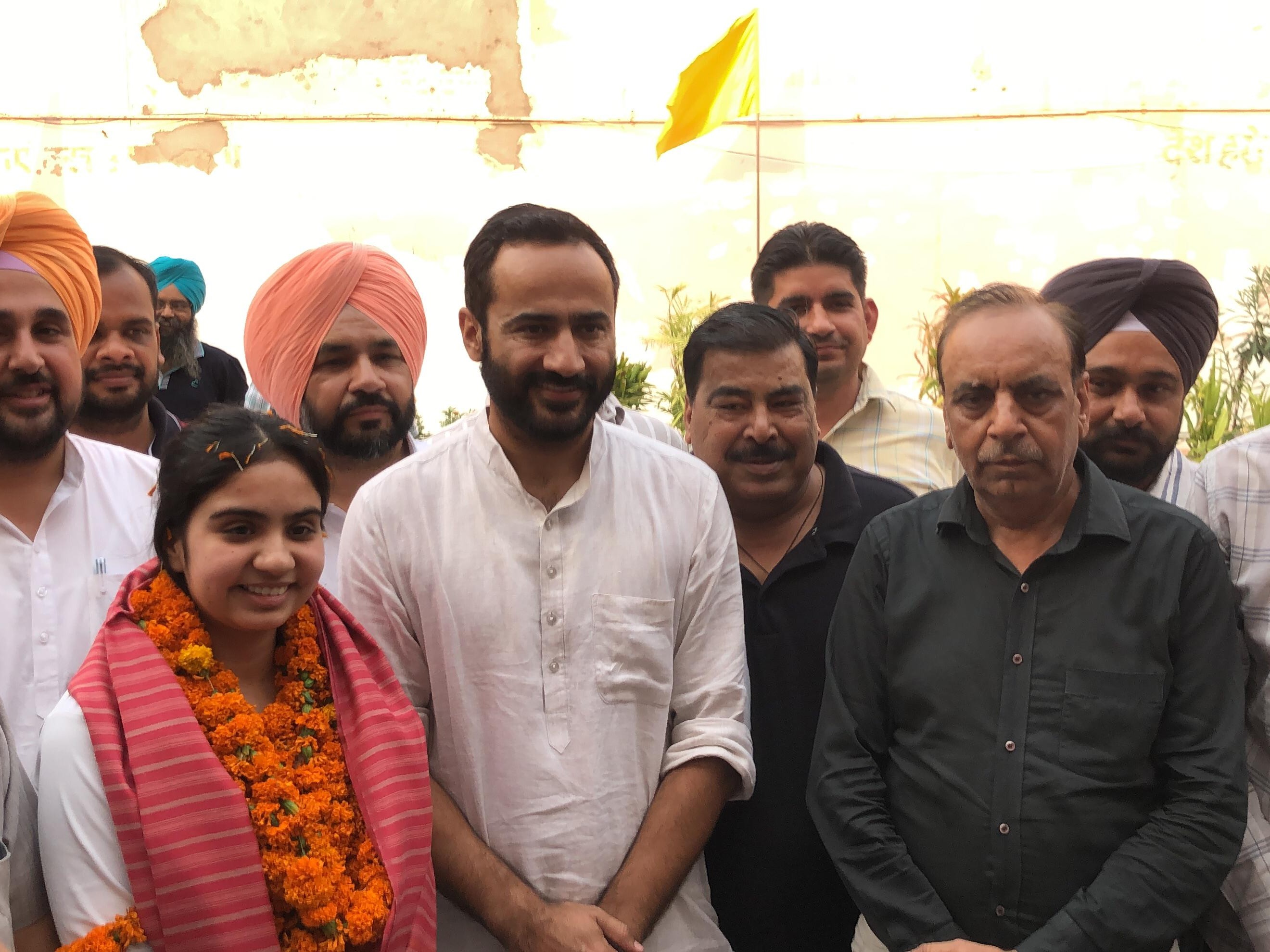 MP congratulating Harsirat Kaur and family members.