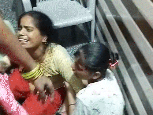 मलबे में दबे लोगों के परिजनों का बुरा हाल।