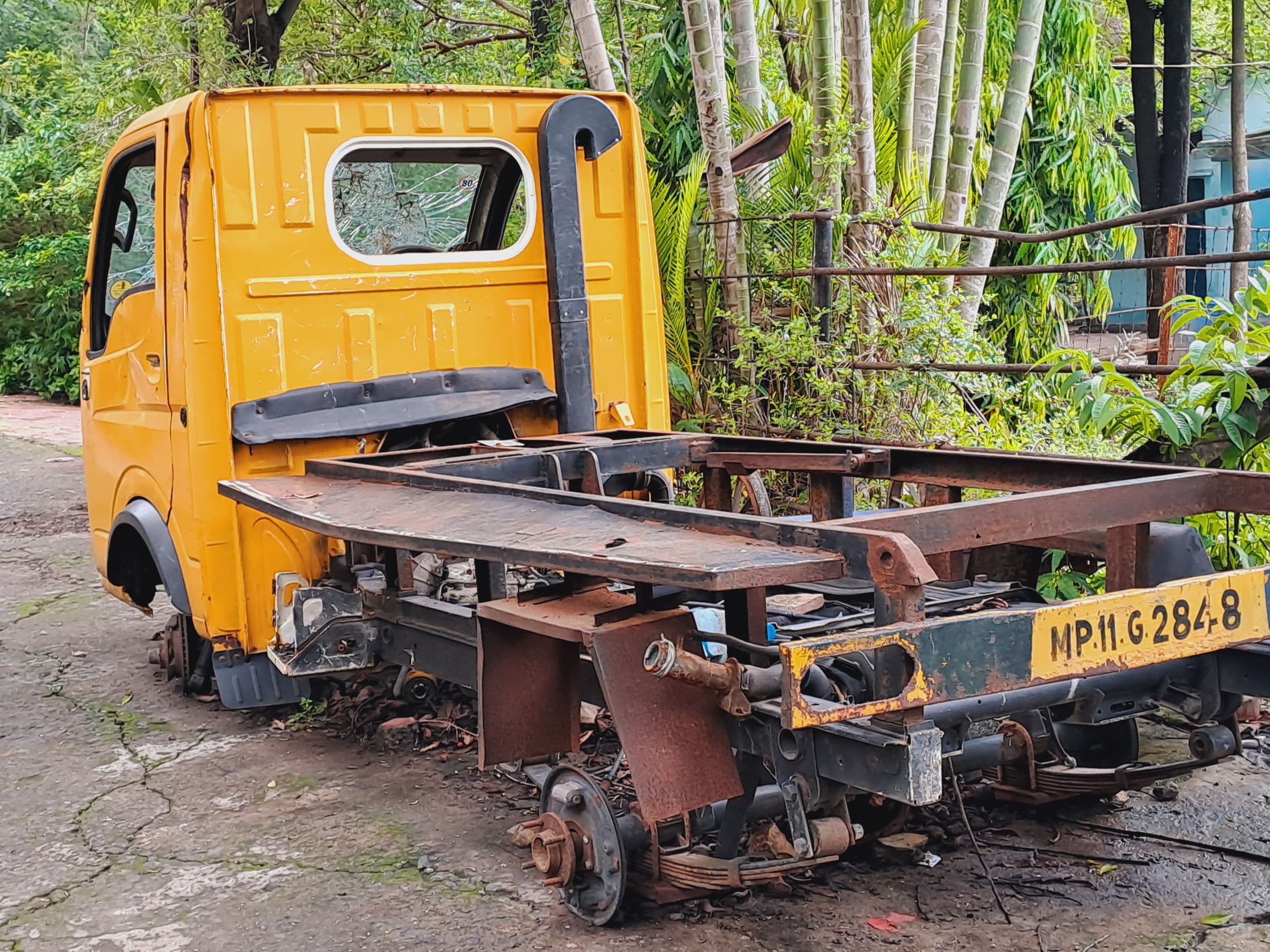 Parts of garbage vehicles parked in Dhar Nagar Palika campus are missing