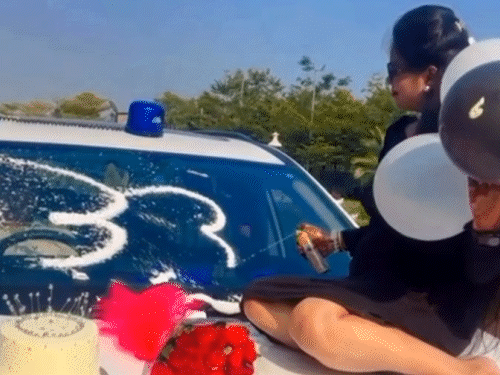 बोनट पर बैठकर बर्थडे सेलिब्रेशन करते हुए वीडियो वायरल हुआ था।