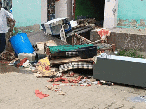 People also threw out the goods while vandalizing the house.