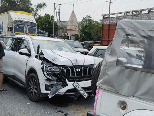 The police jeep moving forward in the convoy took a sudden break, causing the accident.