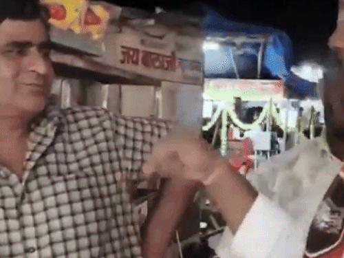 In the video, MNS workers had a debate over the Gujarati shopkeeper not speaking Marathi.