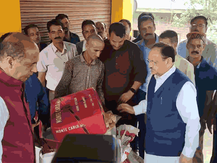 Nadda giving relief material to disaster affected in Nachan Assembly of Mandi