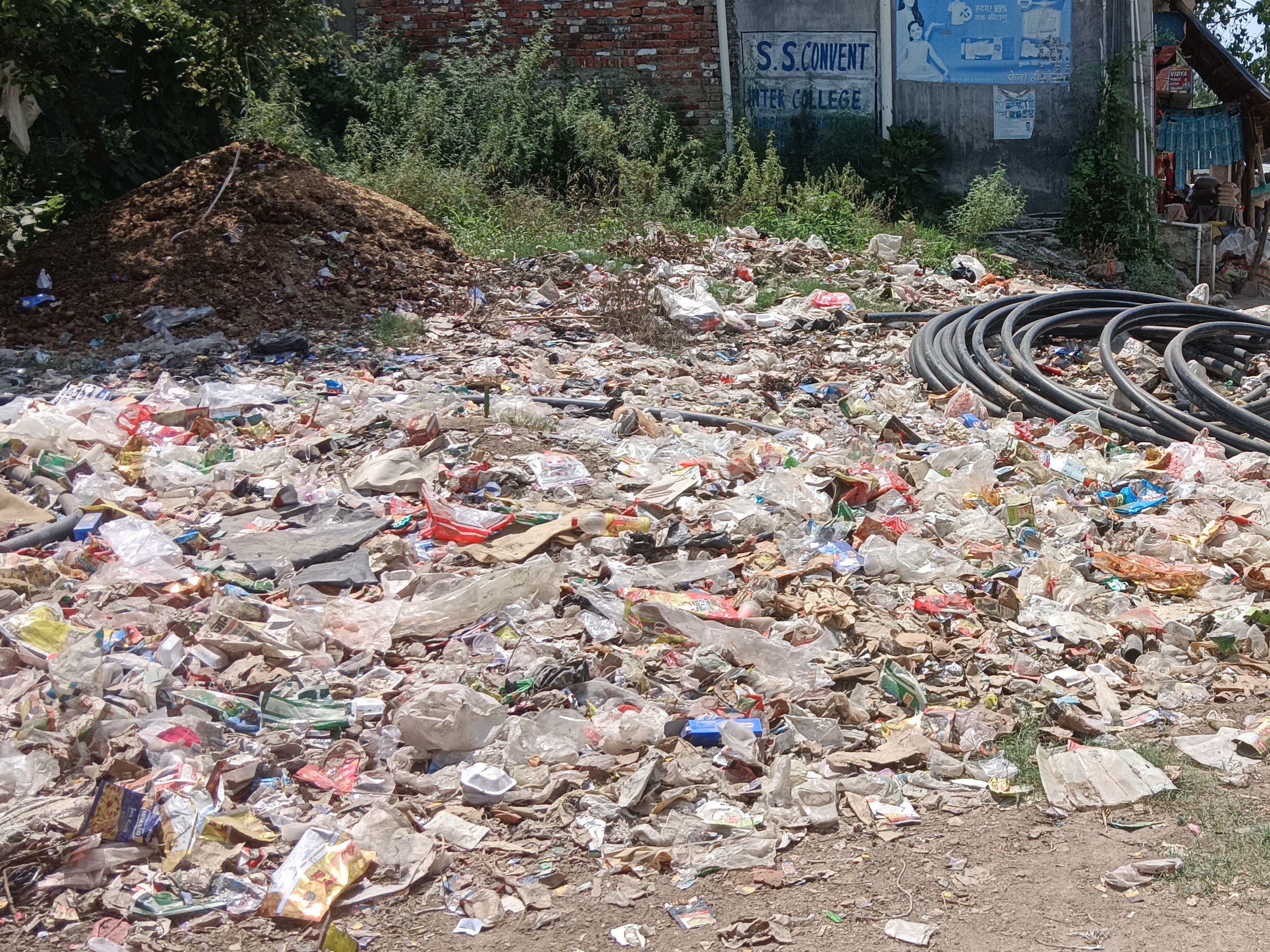 Garbage heap near Maa Durga temple in Siddaur