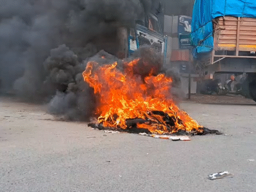 Activists set arson during the protest in Muzaffarpur.