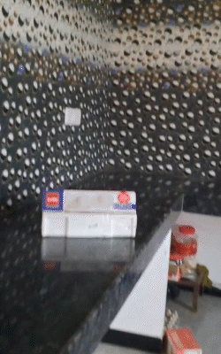 Kothi has expensive tiles and marble. There is a 15 feet wide and 15 feet long kitchen.