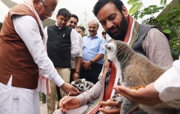 Union Minister Manohar Lal and CM Naib Saini feeding wildlife at Vantara in Jamnagar, Gujarat.