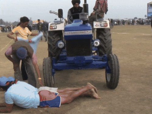 Youth spend the tractor on top of the body in the sports of fort Raipur. -File photo