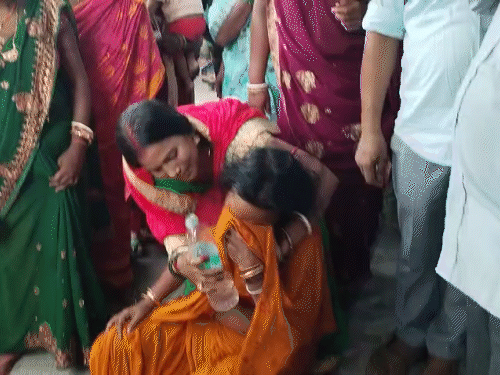 After Amit's death, the mother is in a weeping condition.