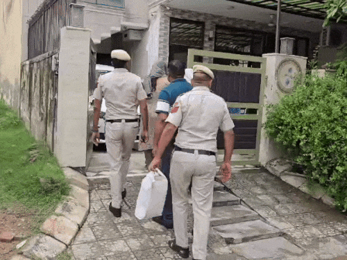 Police reached Radhika's house for investigation after the murder.