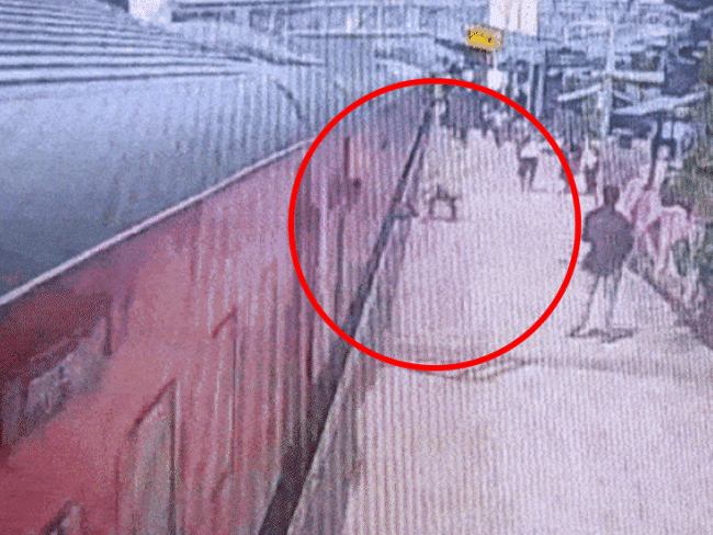 The student got stuck between the platform and the train. A passenger standing nearby pulled him out.