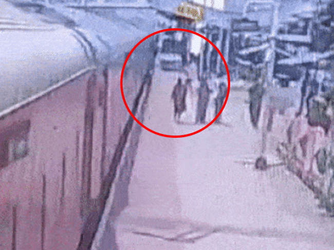 The passenger in the train tried to save the student. But he also fell down.
