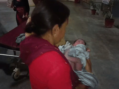 The woman reached the mother-child hospital to the child.