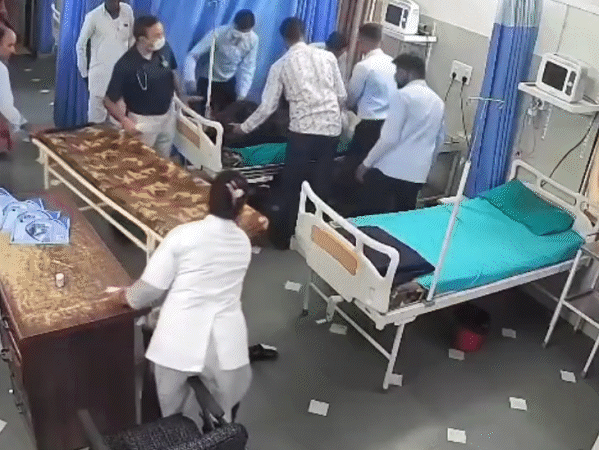 Lying on the bed in ICU, he started giving CPR to the young man.