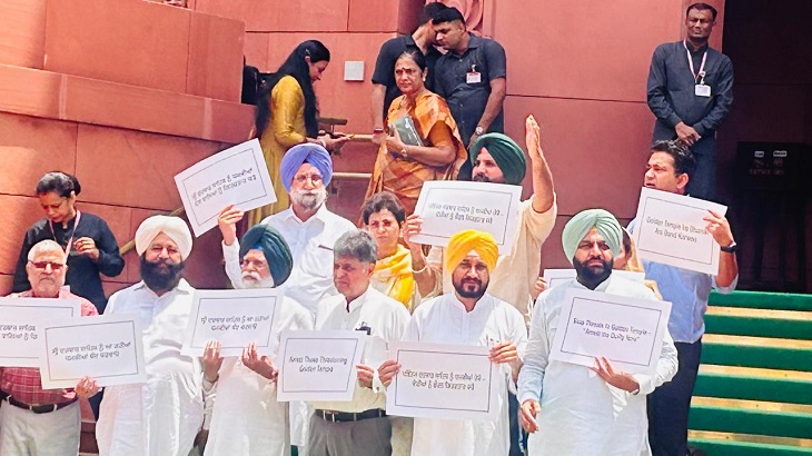Congress MPs demonstrating outside Parliament House.