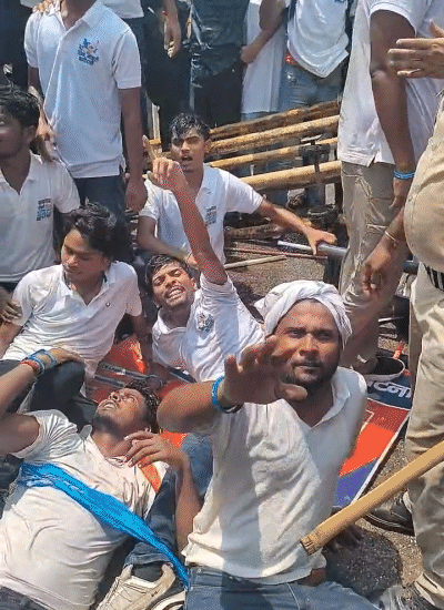 The protesters broke the barricading and lay down on the road.