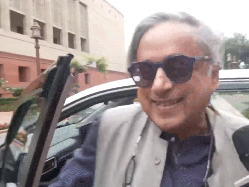 On the question of journalists in the Parliament complex, Tharoor smiled.