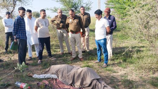 Police personnel standing near the body of a person in Nangal Chaudhary. (File)