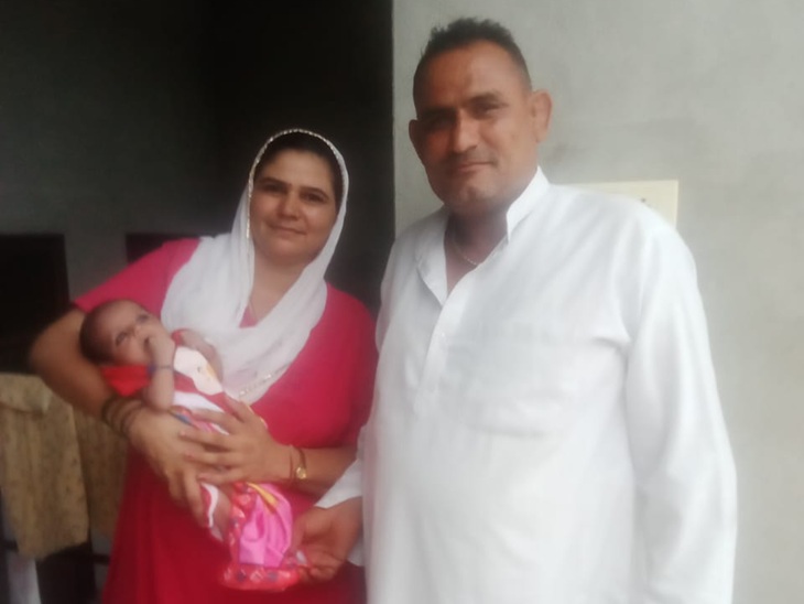 Surendra and Krishna with their daughter.