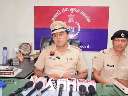 Police spokesperson Sandeep Kumar giving information to the media.