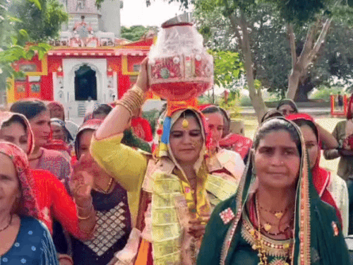 Krishna goes to worship well with the women of the village.