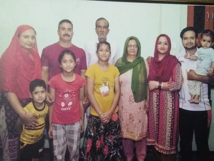 File photo with martyr Arun Kumar's family