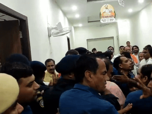 BJP leaders and workers arrived in large numbers in Rohtak's BJP office. Security staff stops them from entering the room.