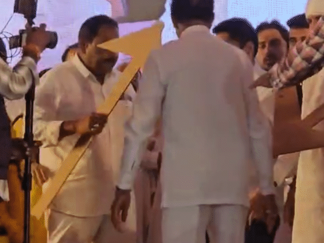 On the stage, plows were presented to Jeetu Patwari and Nakulnath.