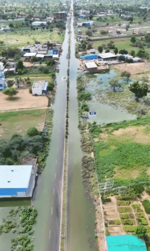 नेशनल हाईवे-52 का ड्रोन व्यू, जिसमें पानी भरा नजर आ रहा है।