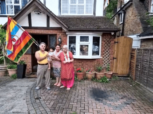 This photo is in front of Pradeep Sood's house in London, from where he comes to Bikaner with the flag of Ramdevra.