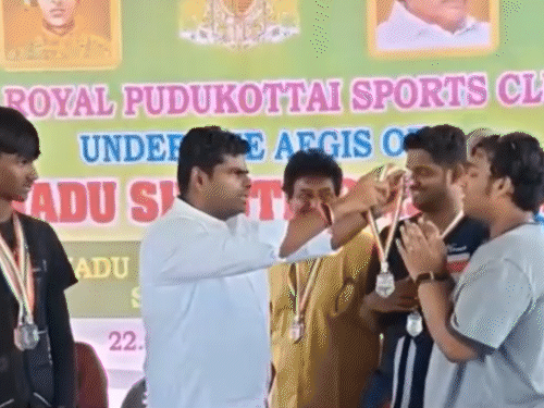BJP leader Annamalai handed over the medal to the DMK leader's son.