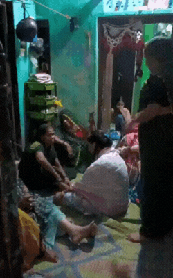 There is a crowd of people at home. Relatives are also present.