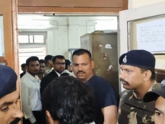 Anwar Qadri reached the court room under police protection.