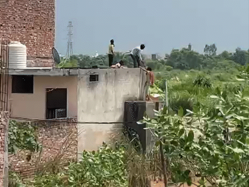 People reached the roofs of houses to rescue.