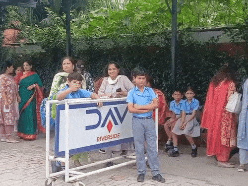 Students returning home after getting discharged at DAV school in Ambala and parents arrived to take them.