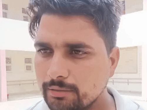 Vikram's brother Pradeep, giving information about the incident.
