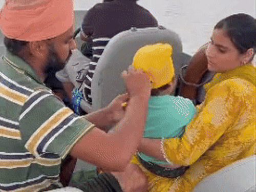 Taking a couple to a safe place with a boat along with a child.