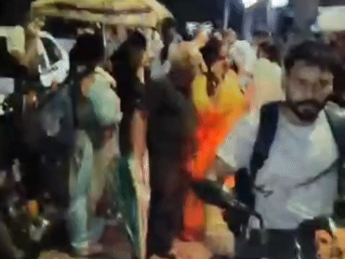 People going to a safe place from Gurdwara Colony along with Paddal in Mandi.