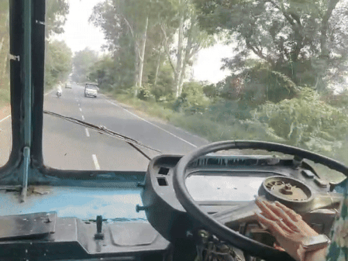 Preity Malik driving a bus during training.