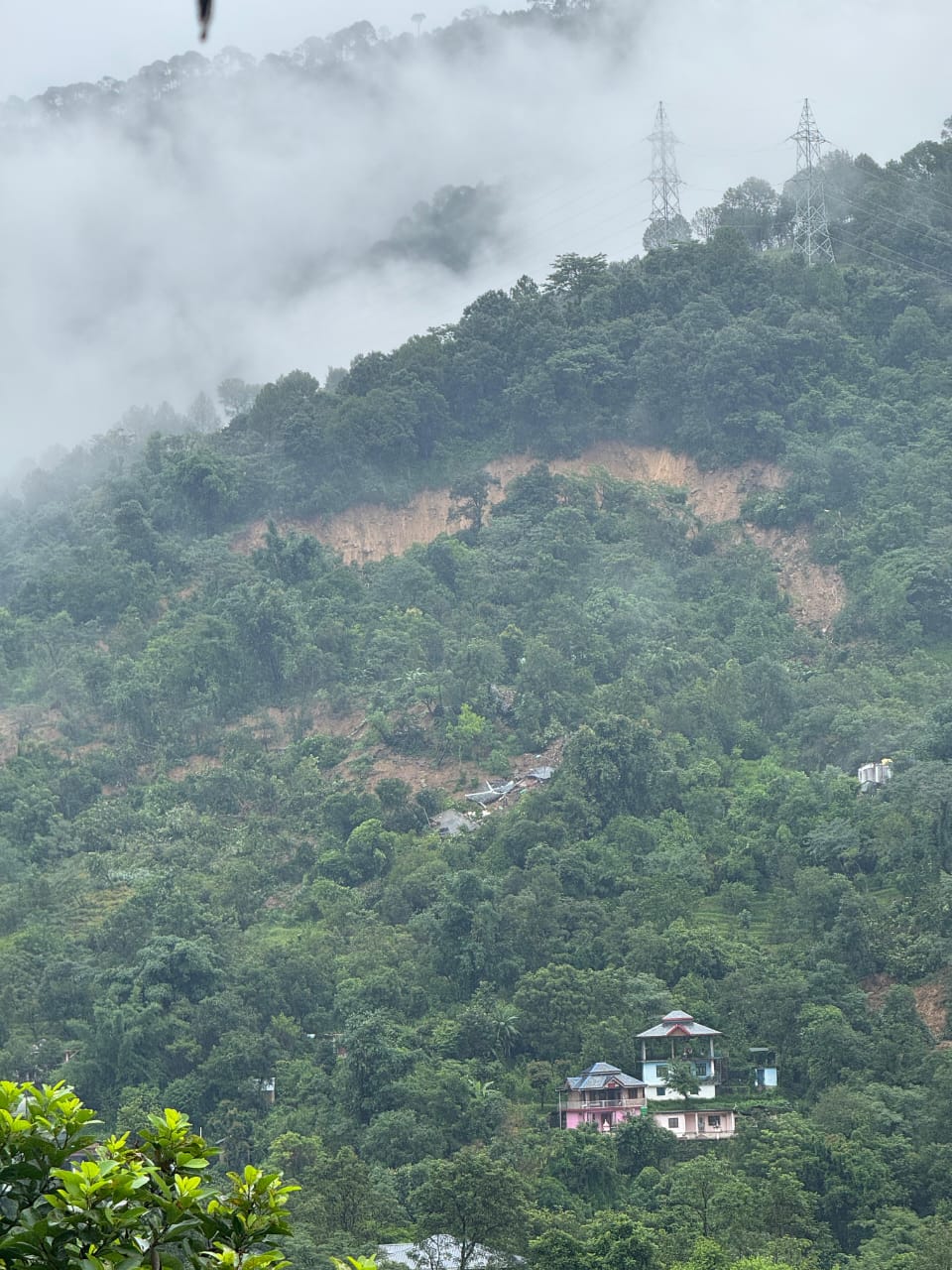 House damaged by the mountain cracking behind Kunduni village in Jogendranagar.
