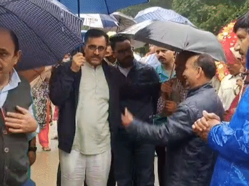 Local administration officials shifting the people of Kunduni village to another place.