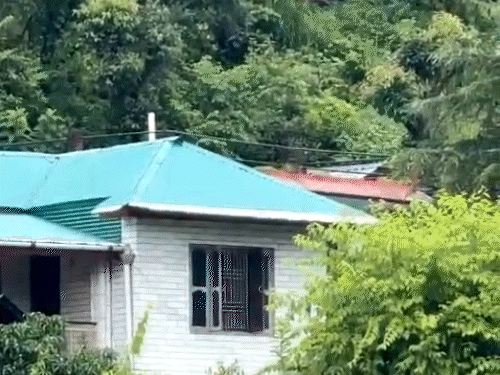 These houses were threatened by the hill collapse behind Kunduni village.