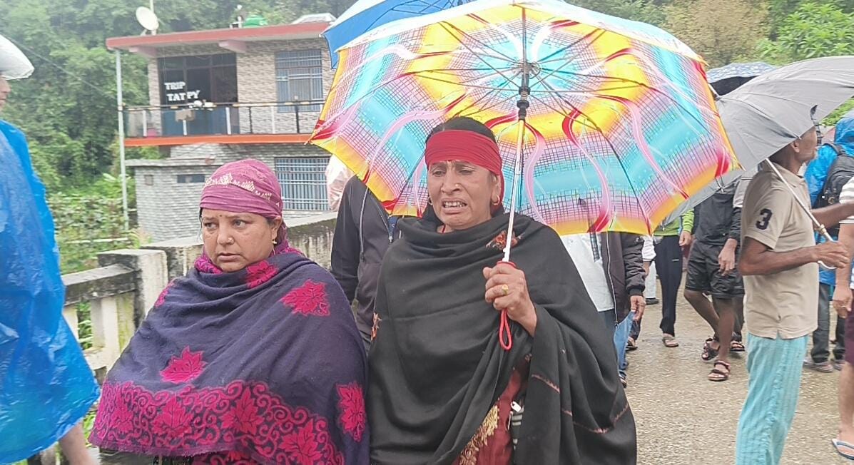 The woman of Kunduni village is emotional and going from home to a safe place.