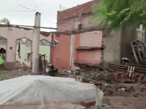 Flood waters in Ramdas areas of Amritsar broken houses.