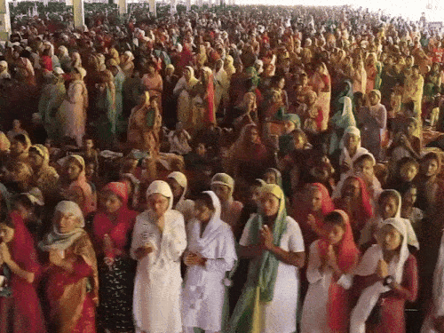 Thousands of his followers standing in Rampal's satsang.