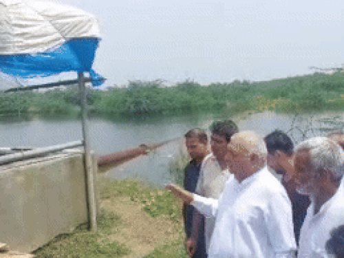 Bhupendra Hooda inspecting the pump house of village Paksma.