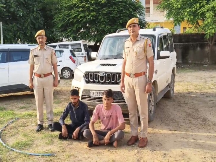 पुलिस की हिरासत में आरोपी और जब्त की गई स्कॉर्पियो गाड़ी।
