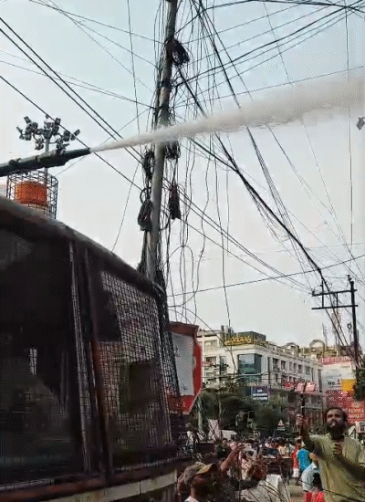 Police used water canon on candidates.
