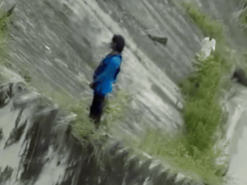 In the viral video, the woman was seen speaking to the person coming up from the stairs of the canal.